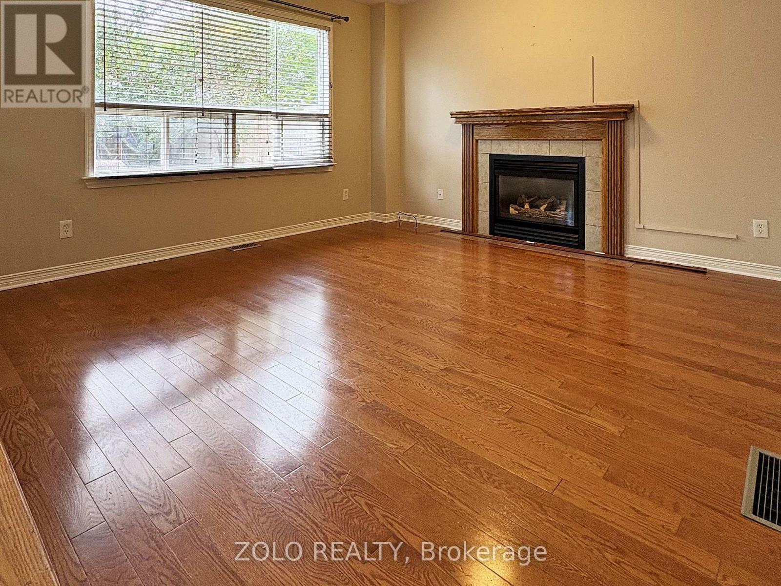 Family room, custom oak mantle - 255 Stoneway Drive, Ottawa, ON