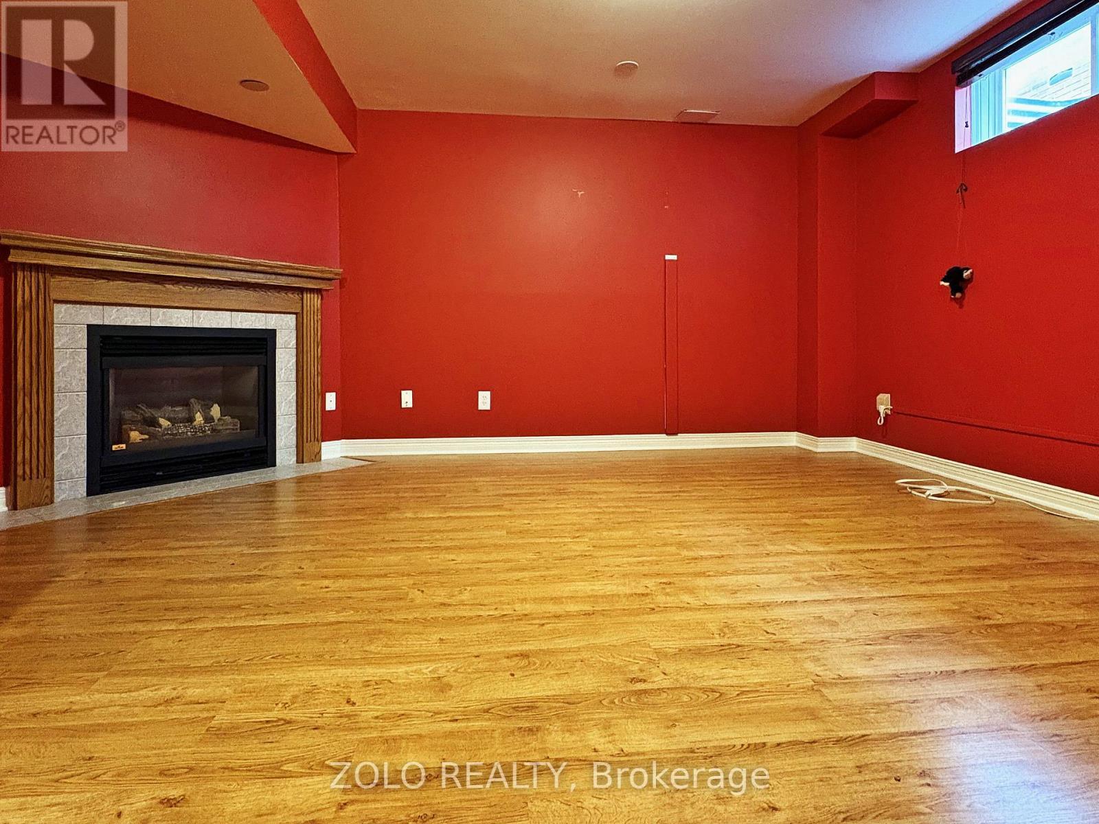 Rec room with gas fireplace - 255 Stoneway Drive, Ottawa, ON