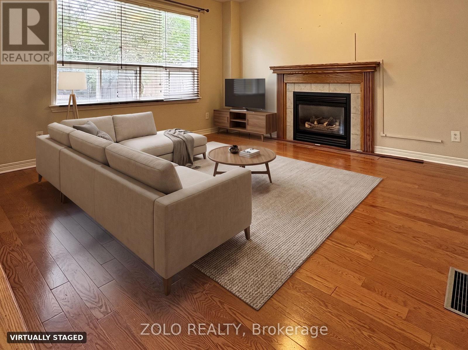 Virtually staged family room - 255 Stoneway Drive, Ottawa, ON
