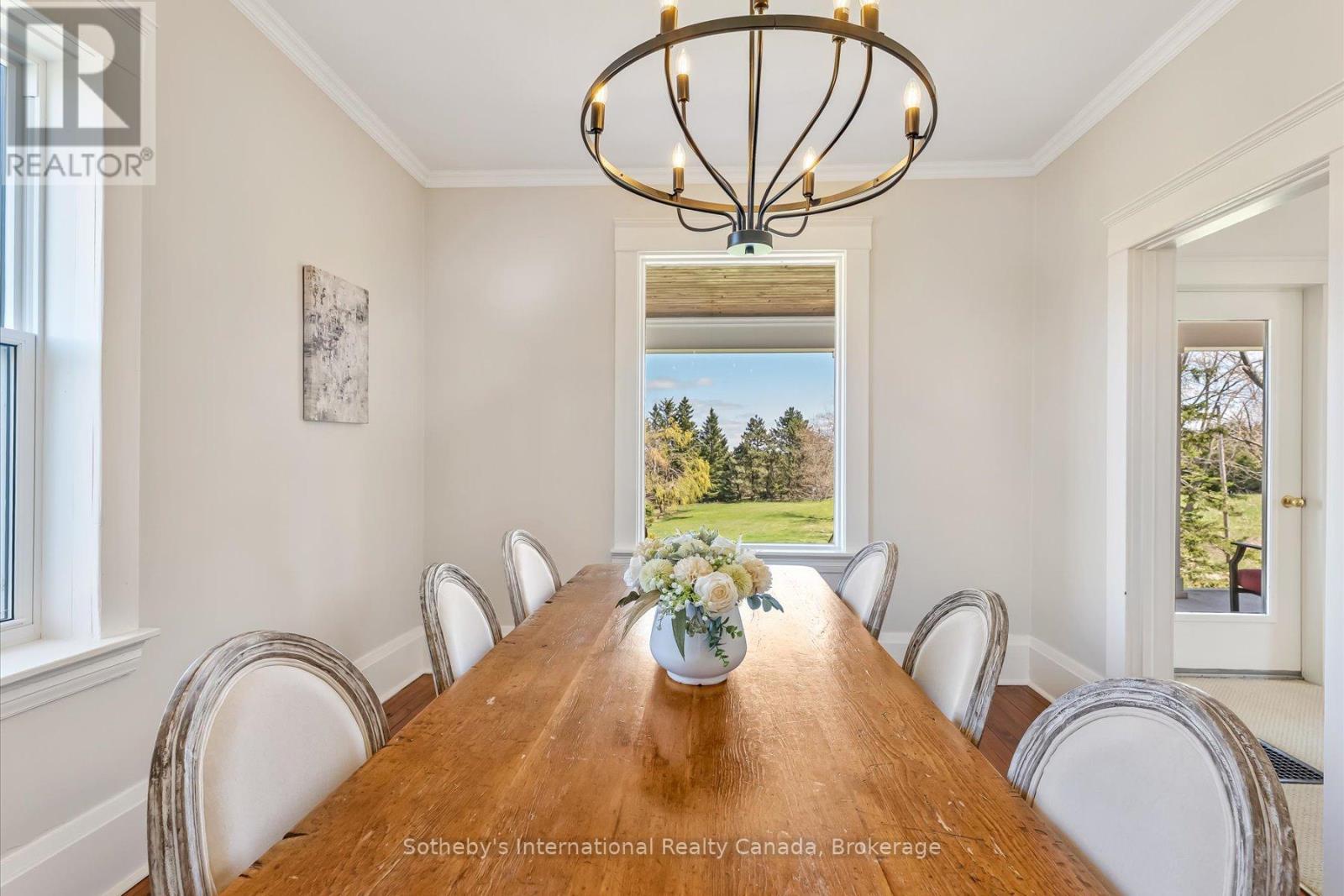 Dining room with view of pond - 717218 1St Line E Ehs, Mulmur, ON