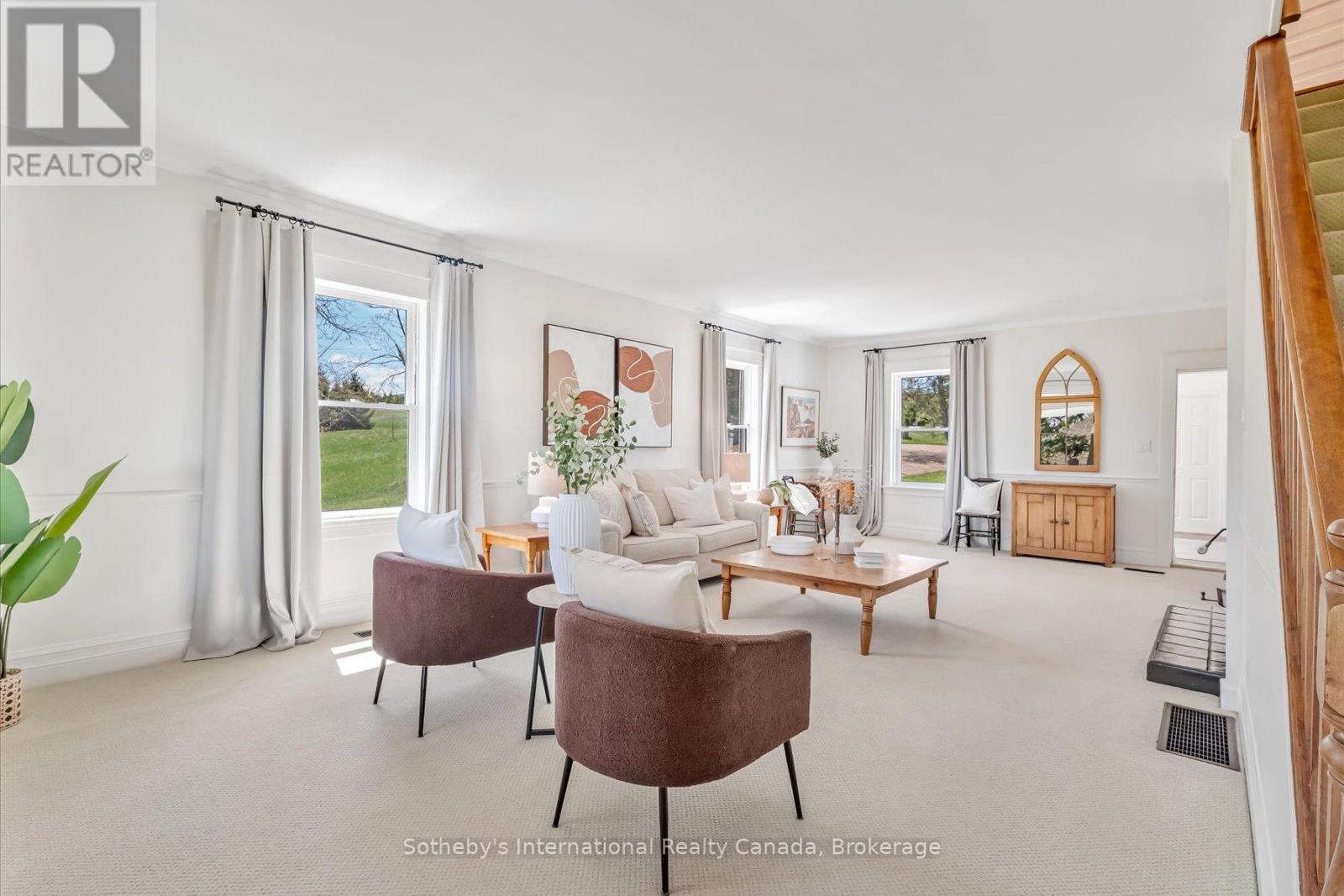 Living room offer large windows and natural light - 717218 1St Line E Ehs, Mulmur, ON