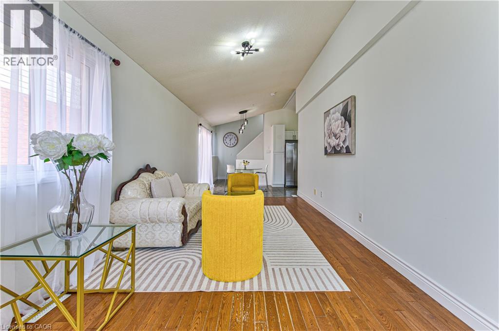 Hardwood flooring throughout the main living area - 168 Copper Leaf Street, Kitchener, ON