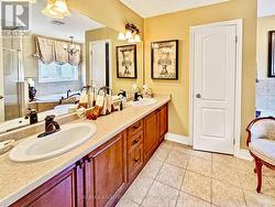 Primary ensuite - double sink and toilet room - 