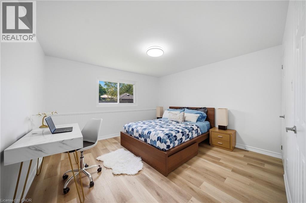 Room featuring light vinyl flooring, white walls, and a single window offering exterior views - 2306 Devon Road, Oakville, ON
