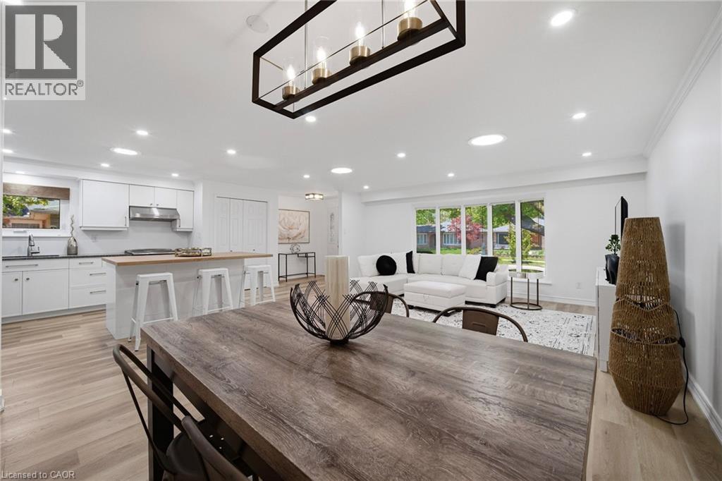 Spacious living area featuring an open-concept layout with recessed lighting throughout - 2306 Devon Road, Oakville, ON