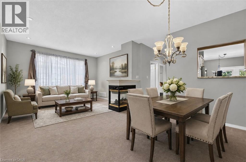 This photo of the living / dining room has been virtually staged. - 159 Thoroughbred Boulevard, Ancaster, ON