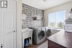 Upstairs Laundry w/ Membrane Floor - 