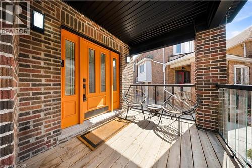 View of exterior entry with brick siding and covered porch - 273 Stinson Crescent, Hamilton, ON 