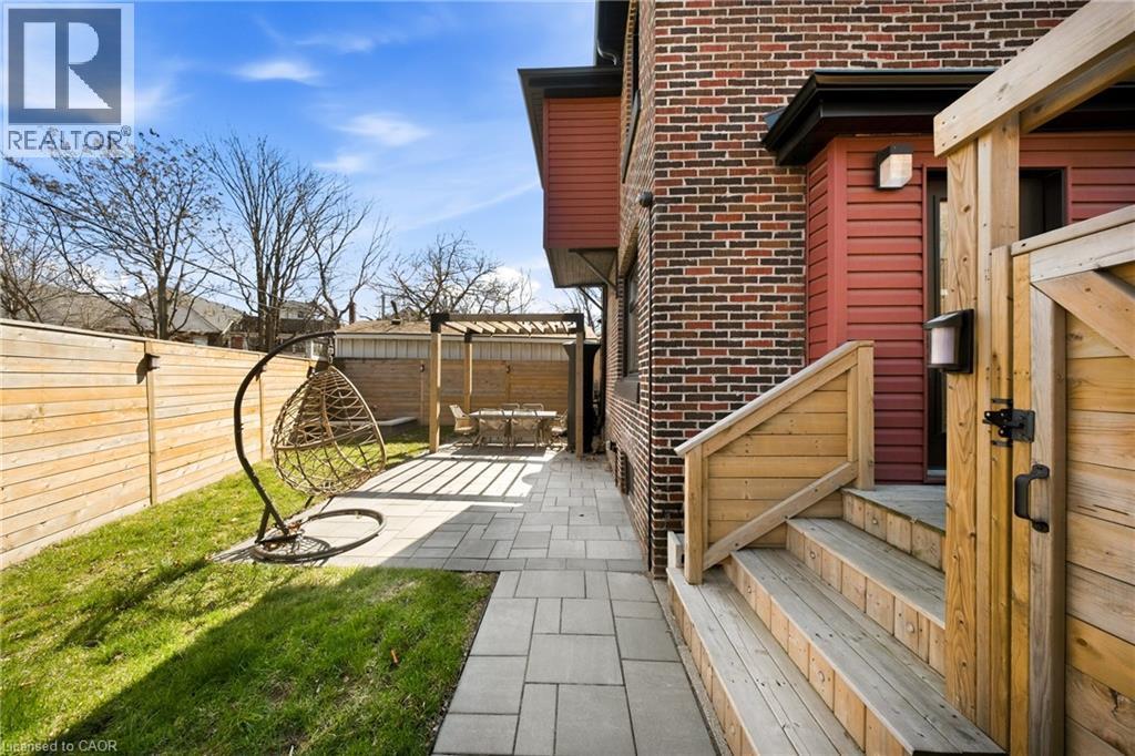 Fenced backyard featuring a patio - 273 Stinson Crescent, Hamilton, ON