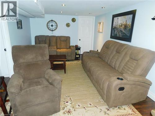 Recessed lighting with light blue walls and a six-panel door - 625 Tate Avenue, Hamilton, ON 