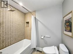 Patterned shower wall tile with integrated niche and rainfall showerhead - 