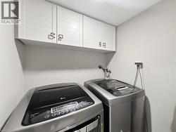 Wall-mounted cabinetry with decorative hardware - 
