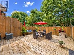 Expansive wood deck with wood privacy fencing - 