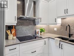 quartz countertops and electric range - 
