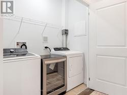 in-suite laundry with full-sized washed and dryer - 
