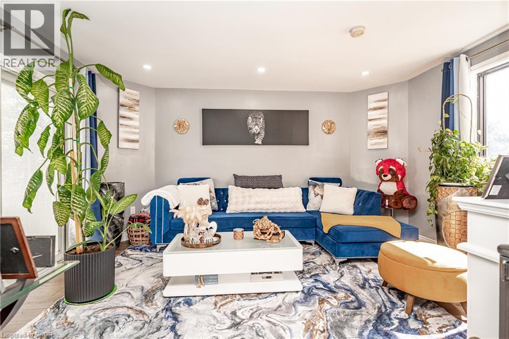 Recessed lighting illuminates the interior space - 52 Charters Road, Brampton, ON