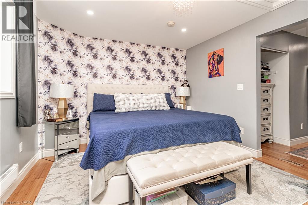 Hardwood flooring, recessed lighting, crown molding, and a built-in closet system - 52 Charters Road, Brampton, ON