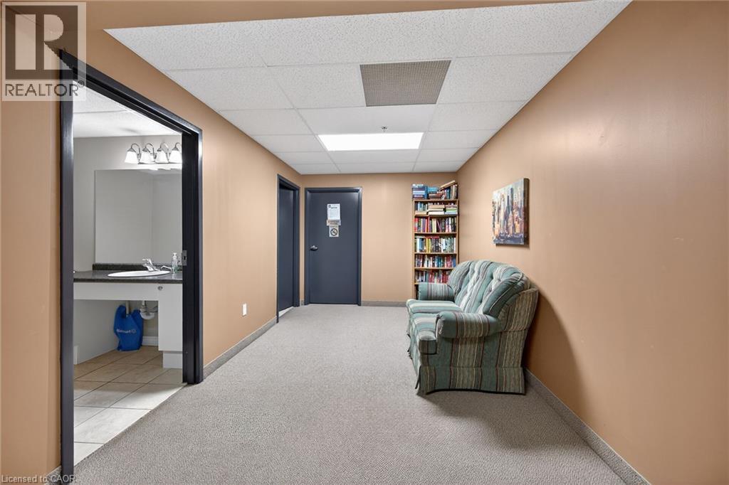 Small library off the gym and entrance to storage units - 908 Mohawk Road E Unit# 308, Hamilton, ON