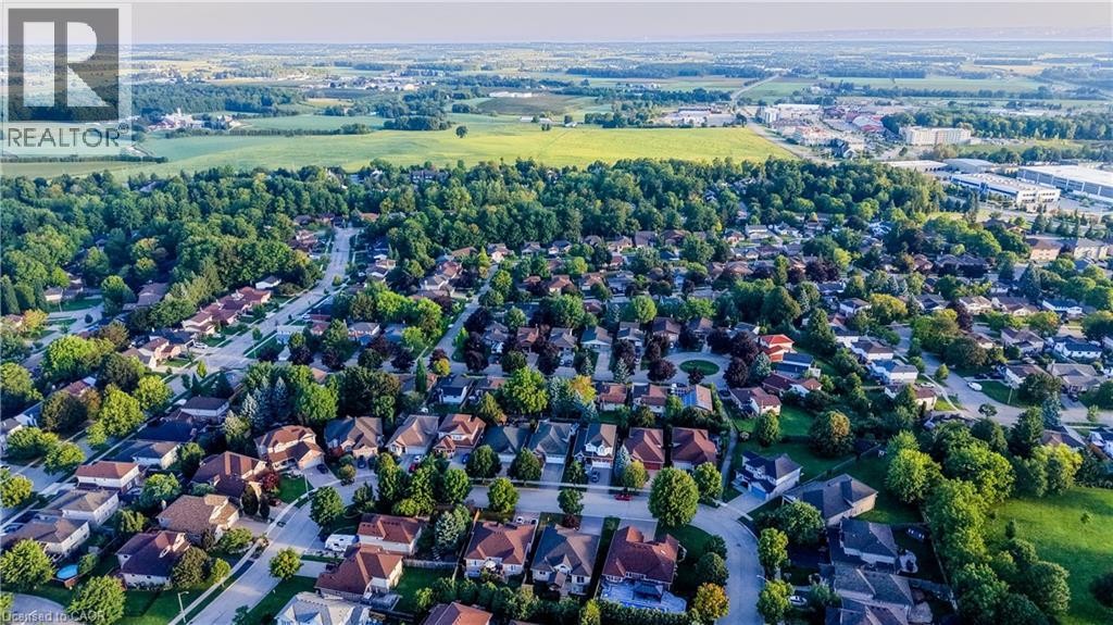 Residential neighborhood with mature trees and surrounding green spaces - 245 Fern Crescent, Waterloo, ON