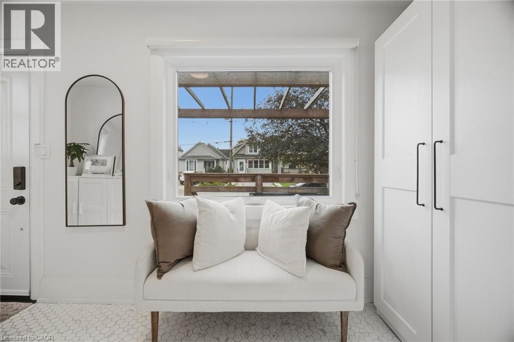White shaker-style built-in cabinetry with black bar pulls - 146 Campbell Avenue, Hamilton, ON