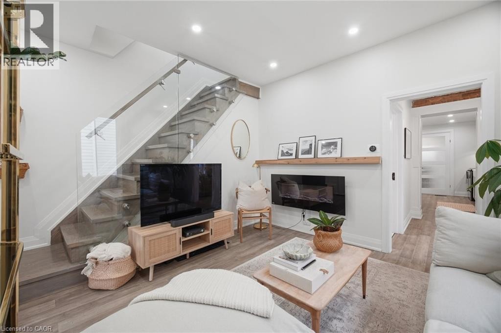 Modern glass staircase with metal railing - 146 Campbell Avenue, Hamilton, ON