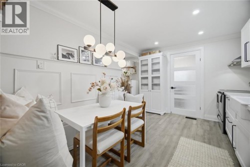 Recessed lighting, crown molding, and wood-finish flooring - 146 Campbell Avenue, Hamilton, ON 