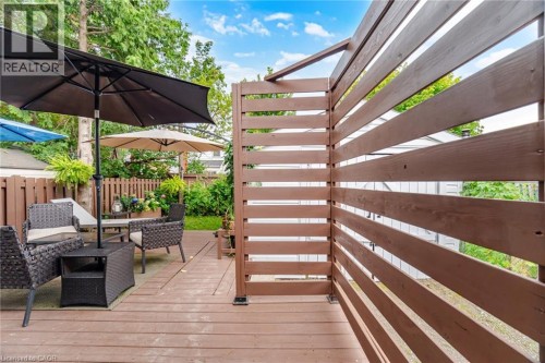 Wood-finish decking with a slatted privacy screen - 146 Campbell Avenue, Hamilton, ON 