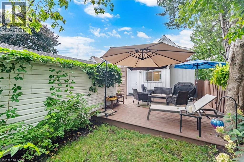 Exterior wood-finish deck with privacy fencing - 146 Campbell Avenue, Hamilton, ON