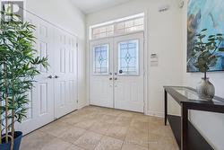 Spacious Foyer with Double-Door Closet - 