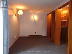 Primary Bedroom with Sitting Area and 2 Closets - 
