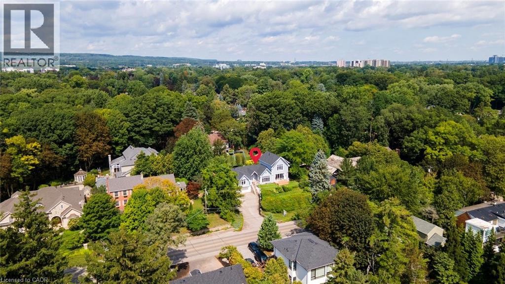Wooded neighborhood setting with extensive tree canopy - 293 North Shore Boulevard E, Burlington, ON
