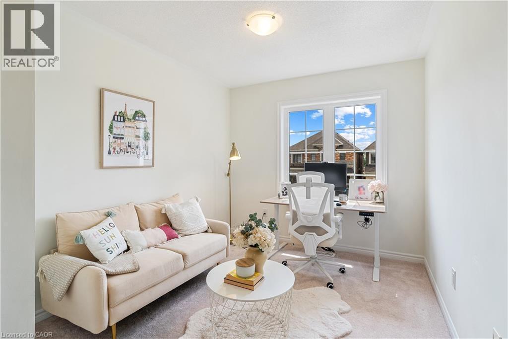 Neutral color palette, window with exterior elements, flush mount ceiling light, light-toned carpeting, ample natural light - 68 Barkerville Drive, Whitby, ON