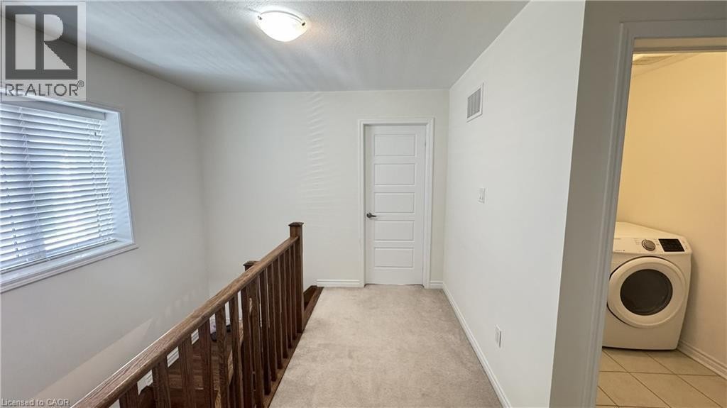 Upper level featuring light-toned carpeting and white walls - 67 Pointer Street, Cambridge, ON