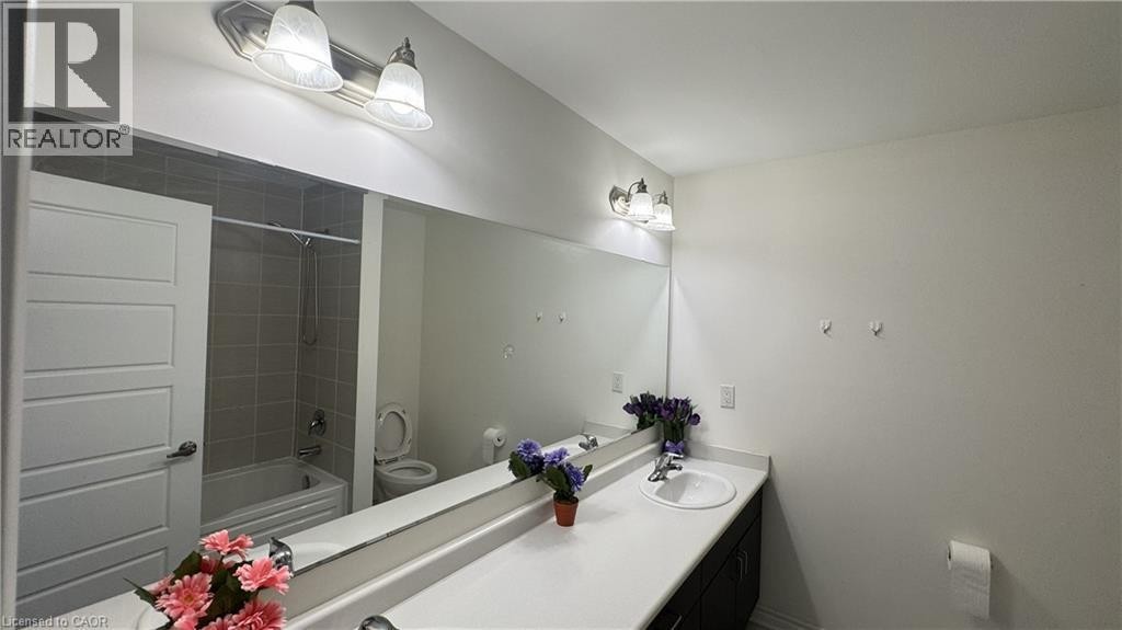Full-width vanity mirror and countertop - 67 Pointer Street, Cambridge, ON