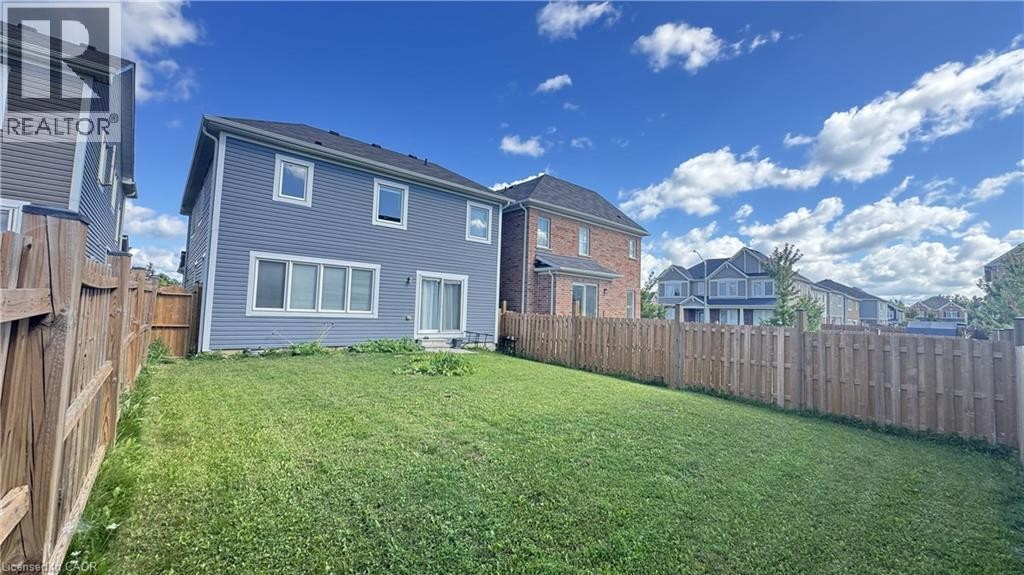 Expansive grassy yard with full privacy fencing - 67 Pointer Street, Cambridge, ON