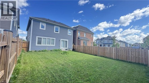 Expansive grassy yard with full privacy fencing - 67 Pointer Street, Cambridge, ON 