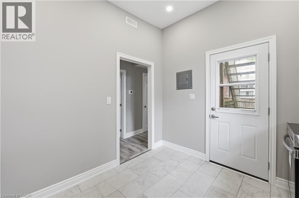 Kitchen with outside access. perfect for sitting area and morning coffee. - 98 Duke Street Unit# 2Nd, Hamilton, ON
