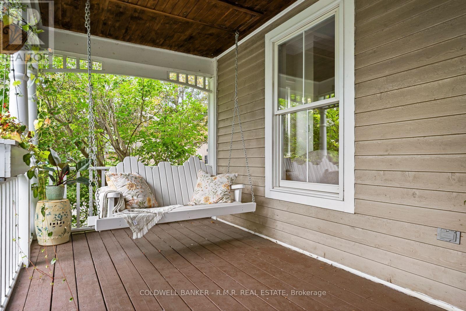 Verandah with re-inforced swing seat - 26 Mill Run Gate, Uxbridge, ON