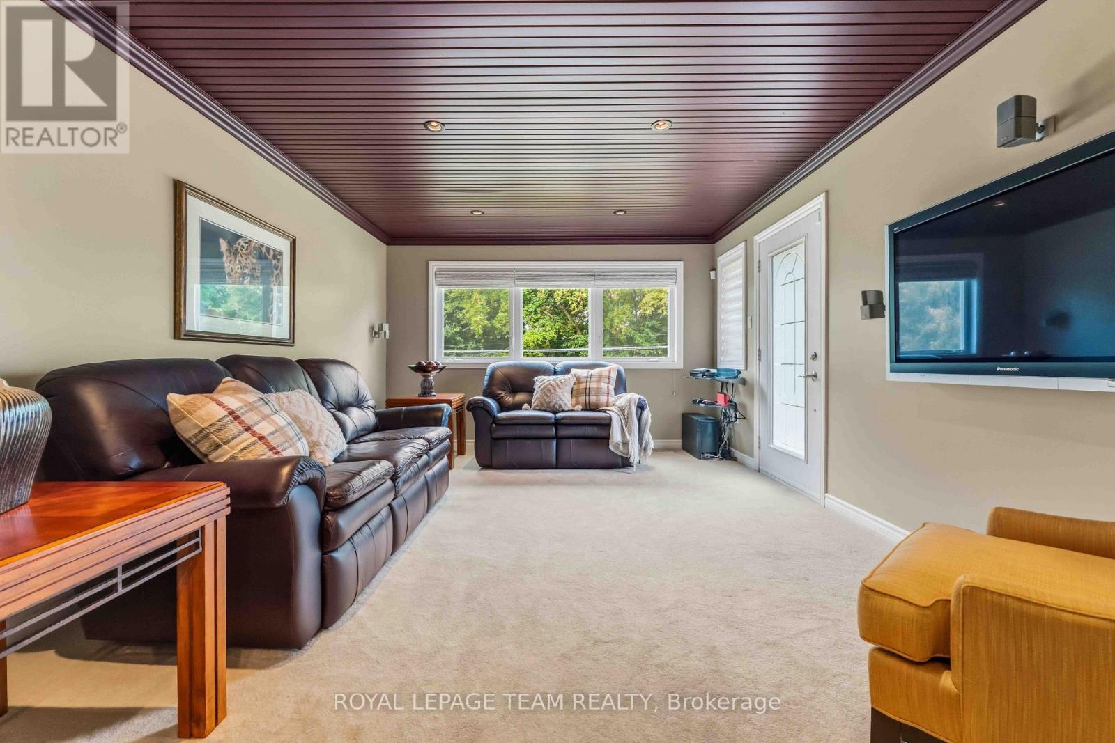 Family room/movie room (main level) - 115 Mountbatten Avenue, Ottawa, ON