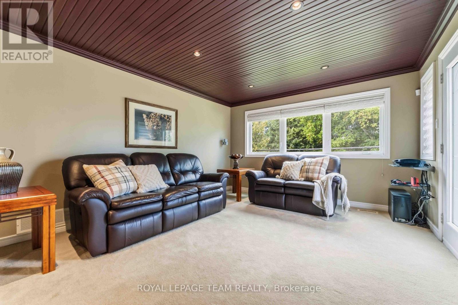 Family room/movie room (main level) - 115 Mountbatten Avenue, Ottawa, ON