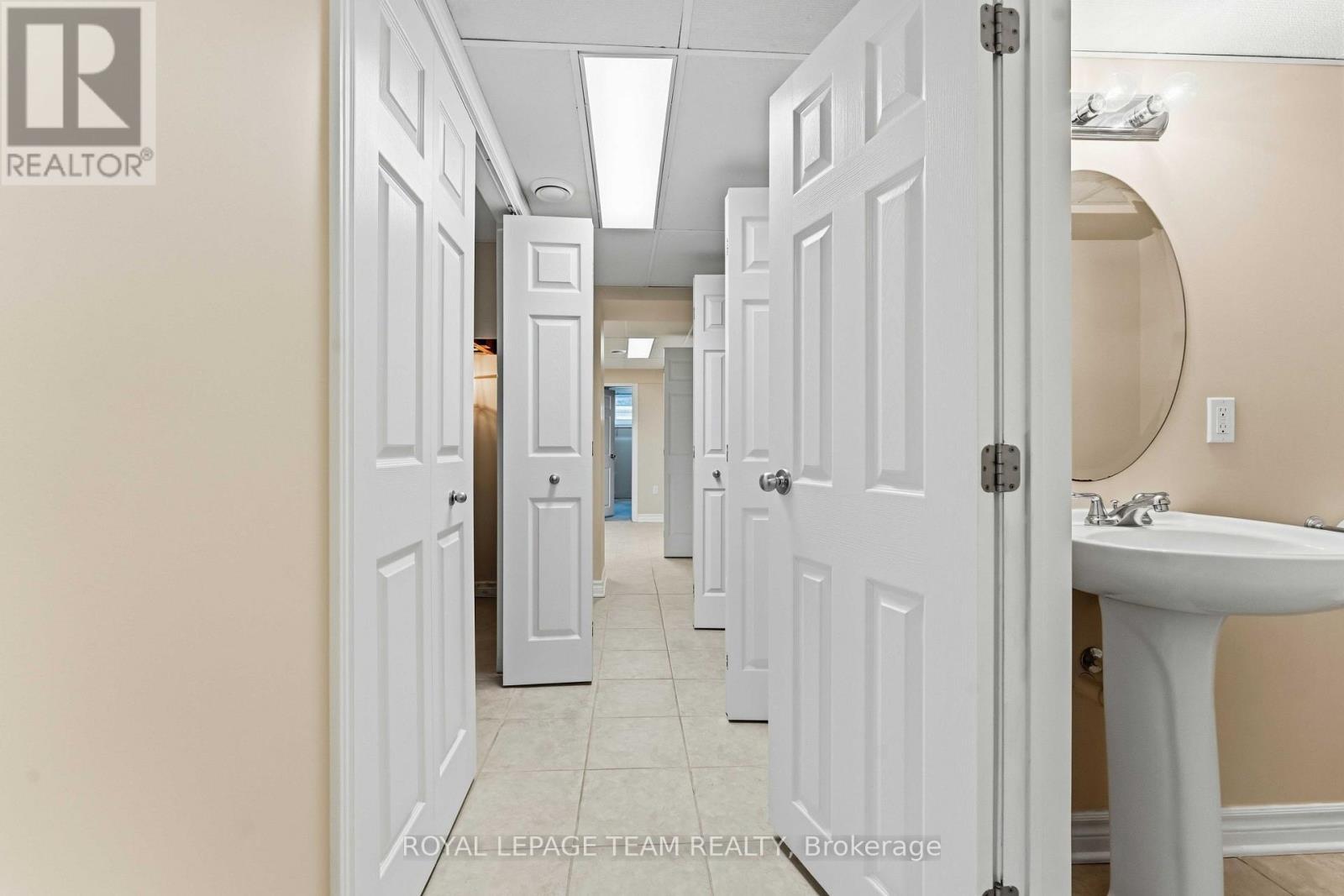 Hall with storage, fridge&freezer, laundry etc. - 115 Mountbatten Avenue, Ottawa, ON