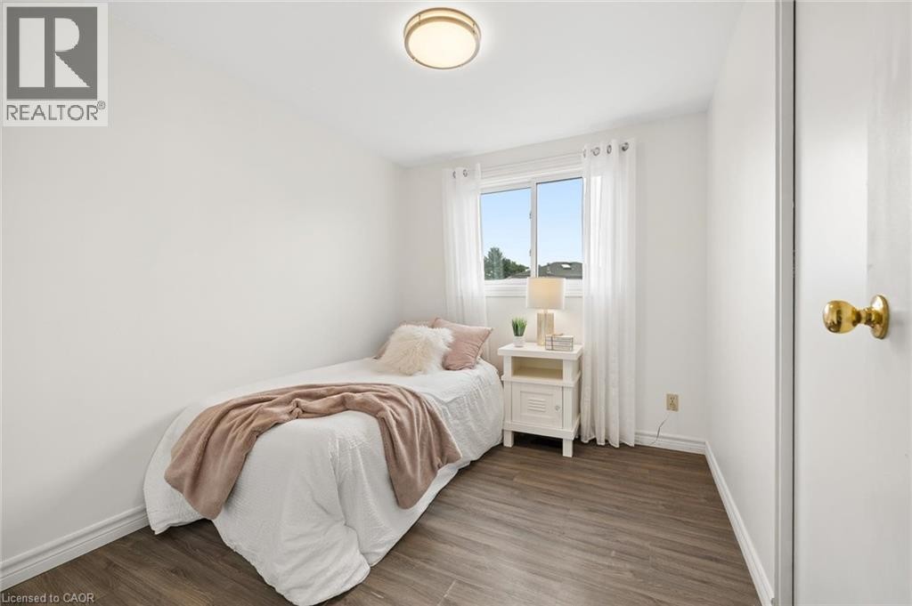 Wood-finish flooring throughout - 76 Cluthe Crescent, Kitchener, ON