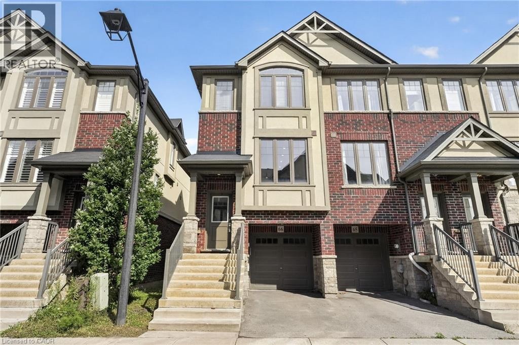 Brick and stucco exterior with multiple gabled rooflines - 1169 E Garner Road E Unit# 66, Ancaster, ON