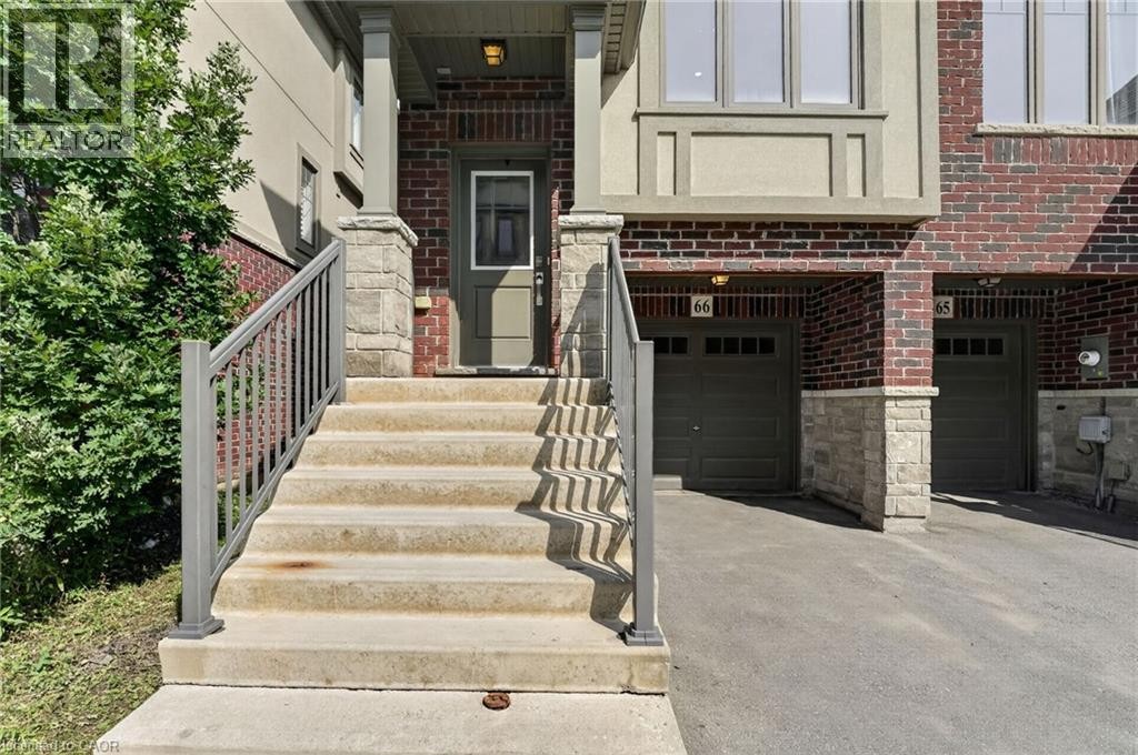Brick and stone veneer exterior with complementary stucco accents - 1169 E Garner Road E Unit# 66, Ancaster, ON