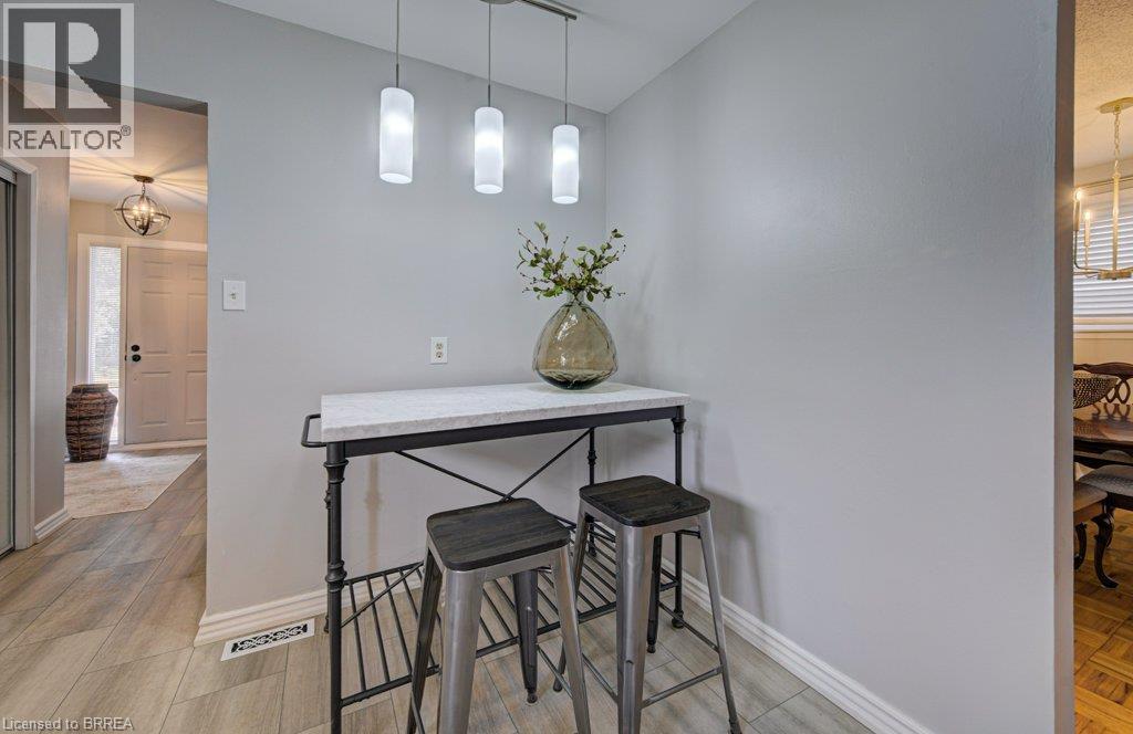 Wood-finish flooring throughout - 3158 Palmer Drive, Burlington, ON