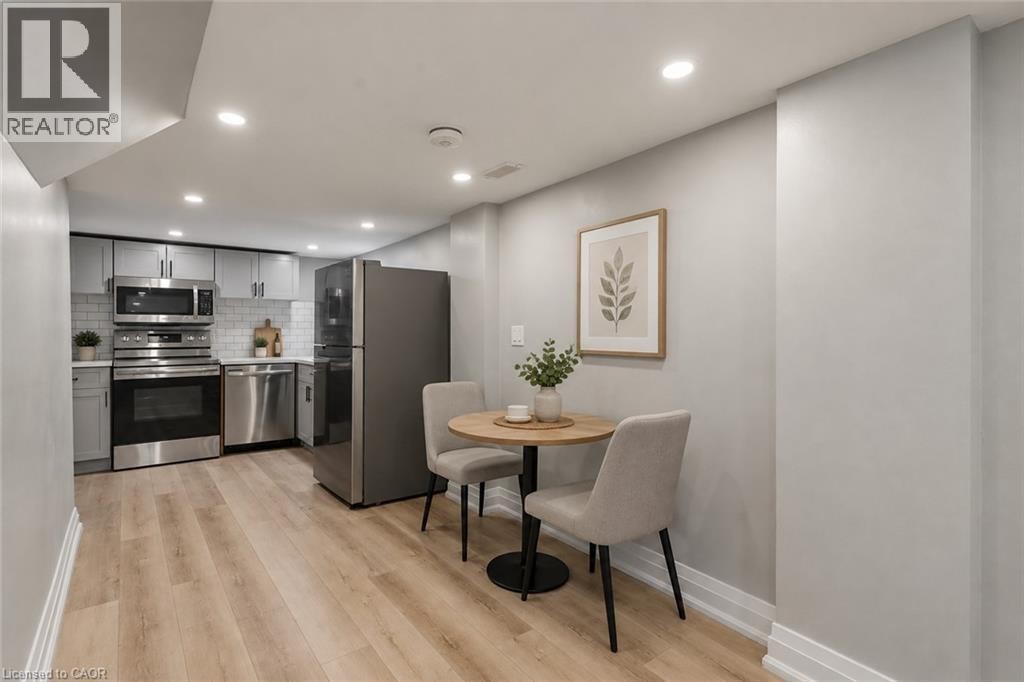 Basement Breakfast Area Virtually staged - 106 Barnesdale Avenue N, Hamilton, ON