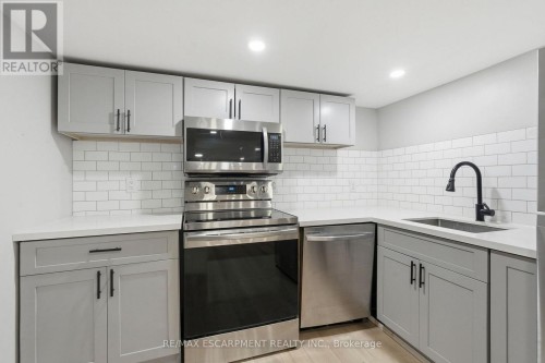 Basement kitchen - 106 Barnesdale Avenue N, Hamilton, ON 