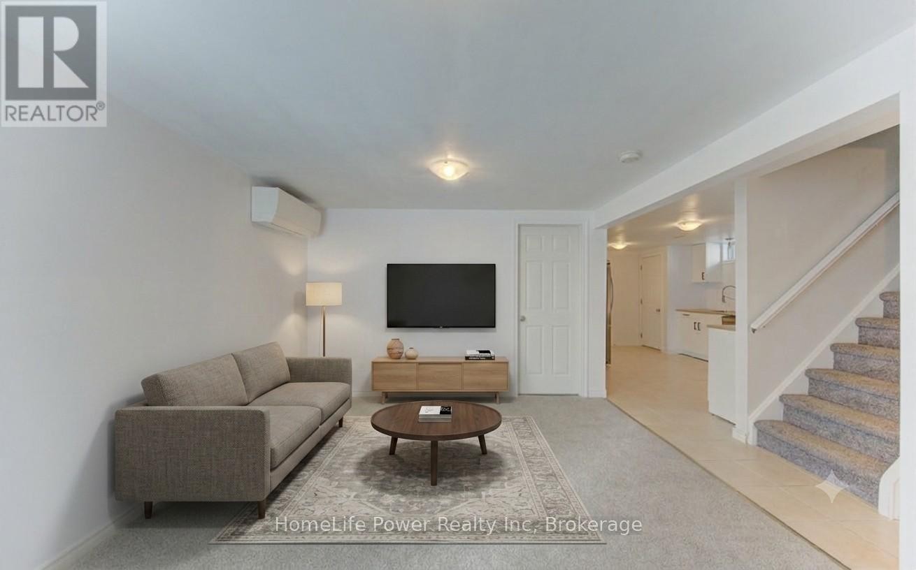 Basement (unit 2) living room AI staged - 136 Dunsmere Drive, Kitchener, ON