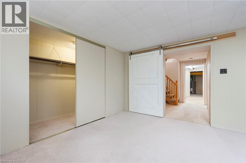 Off Season Storage Closet and Barn Door to Hallway - 1529 Wembury Road, Mississauga, ON