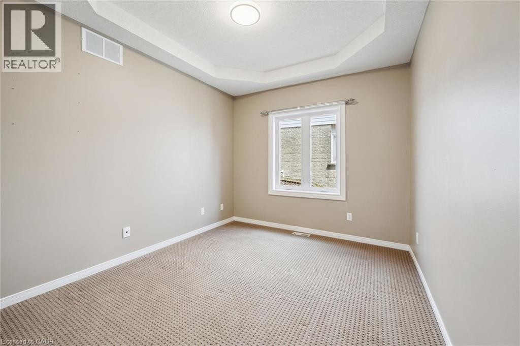 Recessed lighting and a tray ceiling - 426 Hidden Creek Drive, Kitchener, ON
